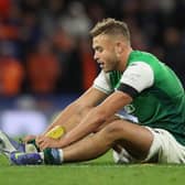 Ryan Porteous of Hibernian sits injured during the Premier Sports Cup semi-final match between Hibernian and Rangers at Hampden Park on November 21, 2021 in Glasgow, Scotland. (Photo by Ian MacNicol/Getty Images)