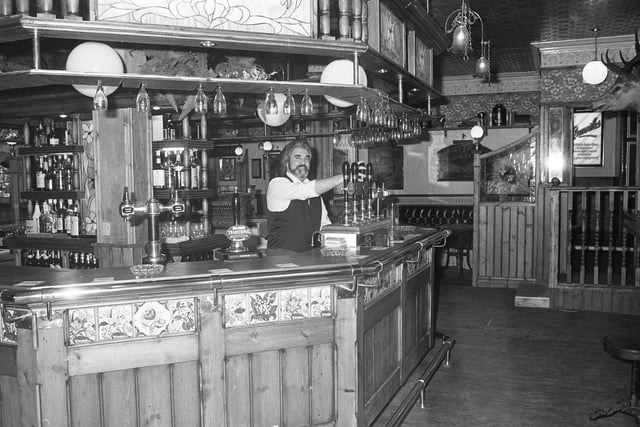 Pictured here in 1985, seasoned drinkers considered it to be an act of licensed heresy when its cherished central bar recently disappeared following refurbishment.