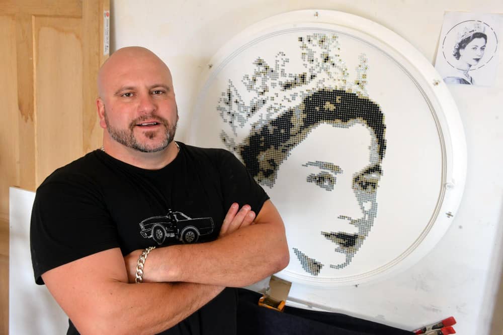 Artist Darren Timby with new Queen Elizabeth nail art.