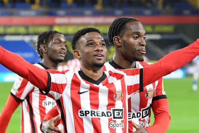 Amad Diallo celebrates his goal against Huddersfield Town.
