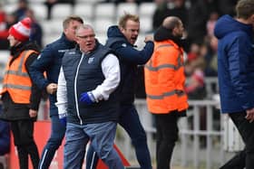Steve Evans and his management team reaction to the late equaliser against Sunderland.