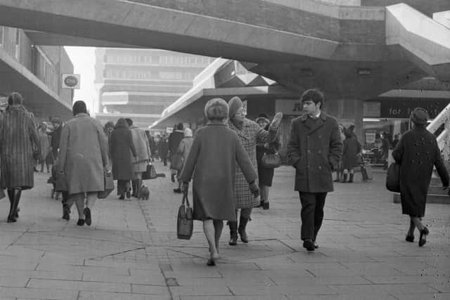 The signs for C&A and Mothercare can just be spotted in this town centre view from 1971.