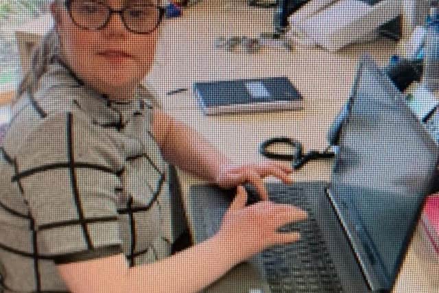 Work experience student Anna Neal, 22, making use of one of the donated laptops.