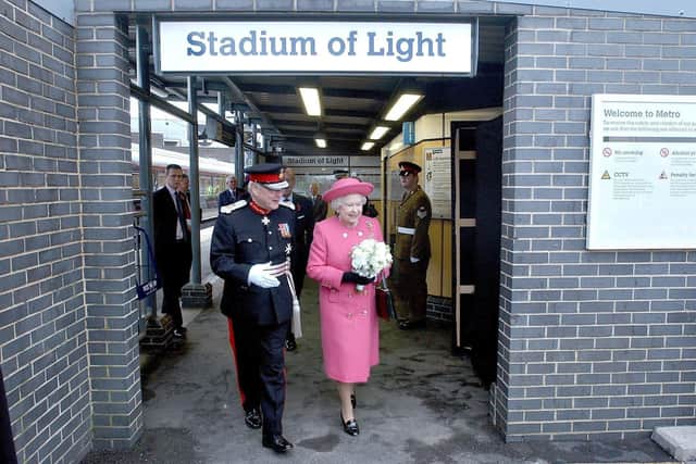 Her Majesty leaving the station with the flowers which were presented to her by Lois.