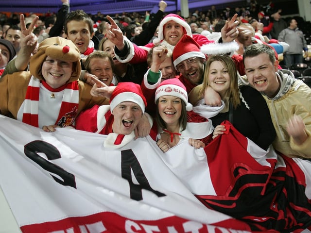 Sunderland fans celebrate their victory during the Premier League match between Hull City and Sunderland at The KC Stadium on December 20, 2008.
