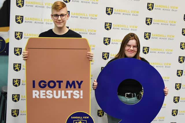 Sandhill View Academy students Finlay Anderson and Leona Barker, both 16, celebrate attaining nine grade 9s in their GCSEs.
