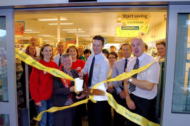 Cutting the ribbon to officially open the new Morrisons store in Castle View, Castletown, Sunderland in 2014.