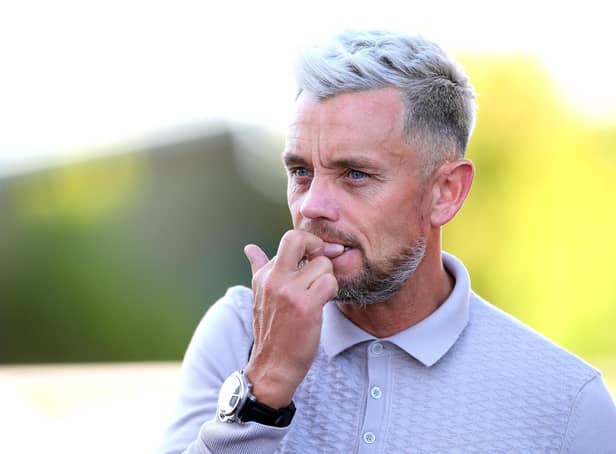 MANSFIELD, ENGLAND - MAY 14: Sky Sports football pundit Lee Hendrie looks on prior to the Sky Bet League Two Play-off Semi Final 1st Leg match between Mansfield Town and Northampton Town at One Call Stadium on May 14, 2022 in Mansfield, England. (Photo by Pete Norton/Getty Images)