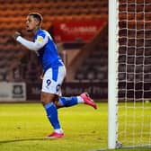 Jonson Clarke-Harris of Peterborough United celebrates after scoring his side's second goal during the Sky Bet League One match between Plymouth Argyle and Peterborough United.