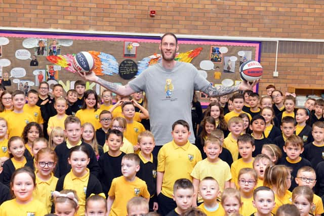 The world's tallest basketball player Paul "Tiny" Sturgess, who is also thought to be the UK's tallest man, visits Fatfield Academy to talk about his career and embracing diversity.