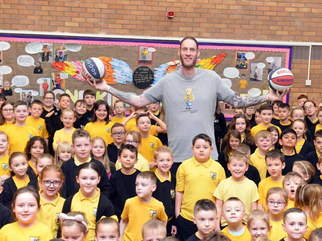 The world's tallest basketball player Paul "Tiny" Sturgess, who is also thought to be the UK's tallest man, visits Fatfield Academy to talk about his career and embracing diversity.
