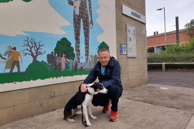 Artist Chad McCail with his friend Kai. She is one of the subjects in the mural. Sunderland Echo image.