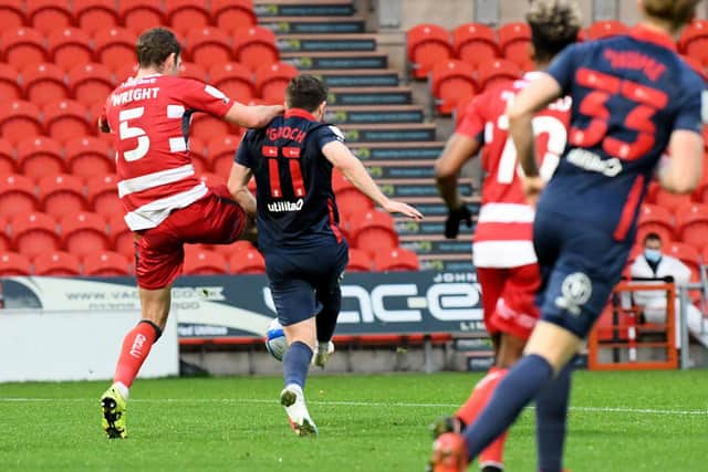 Lynden Gooch is brought down in the Doncaster boss