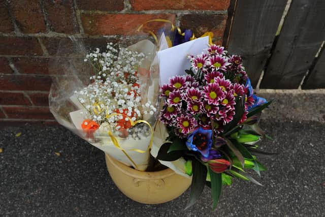 Floral tributes left outsideof a house in Park Avenue, Silksworth.