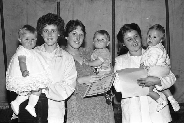 The 7-12 months section, where Barry John Greenwell with his mum Linda (centre), Kaye Louise Todd with  her mother Sheila (left) and  Ian Collier, with his mum Denise did well in the 1981 Sunderland Carnival Bonny Baby Competition.