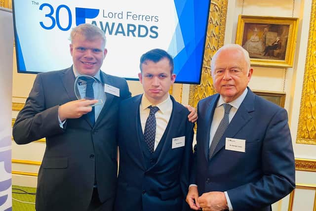 Award winning Washington police cadet Michael Kerr, centre, with colleague Daniel Kelly and broadcaster Martyn Lewis.