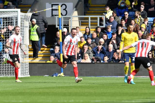 Corry Evans celebrates Sunderland's opener at the Kassam Stadium