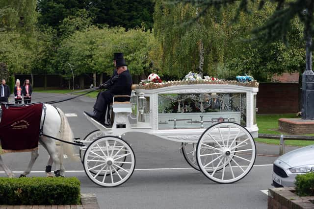 The horse drawn carriage carrying the coffin of Gavin Donnelly who sadly passed away at the age of just 33.