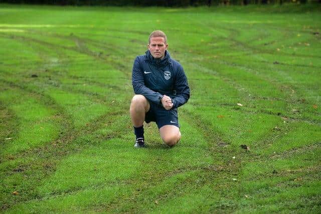 Washington AFC Head of Football, Gary Sykes at the destroyed pitches last year