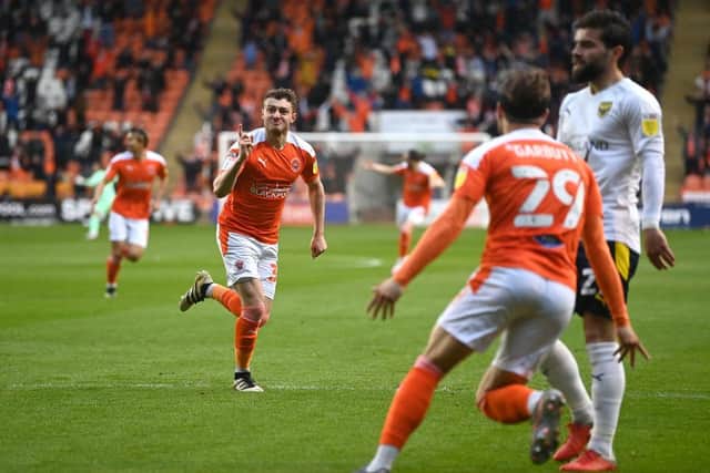 Elliot Embleton celebrates his superb play-off goal for Blackpool