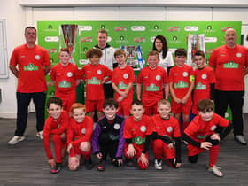 Karl Jarvis and Stephen Ridley, coaches at Hylton Juniors Football Club, Sunderland with Jasmin May from Your Move and former Sunderland player Grant Leadbitter and Hylton Juniors U10s in their new kit after the club won the kit in the EFL and Your Move's 'Your Club Your Kit' competition. Picture: Anna Gowthorpe