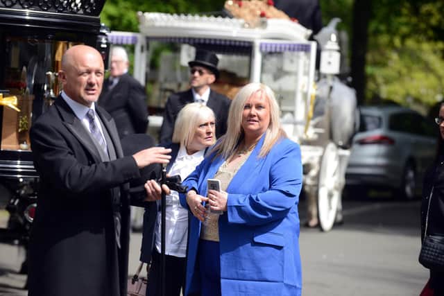 Elaine Rennie attends the funeral of her father Alastair and brother Mark Rennie.