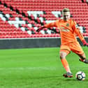 Paul Woolston, playing for Newcastle United's Under-23s at the Stadium of Light, scores a penalty against boyhood club Sunderland.