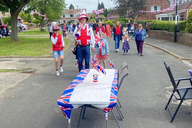 The parade comes to Fairburn Avenue, Houghton