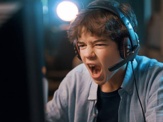 ​Ofcom found that more than half of children who game online played sometimes with people they have never met. Photo posed by model