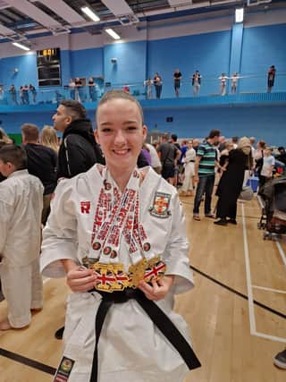 Dokan's Elle Smith with her medal haul.