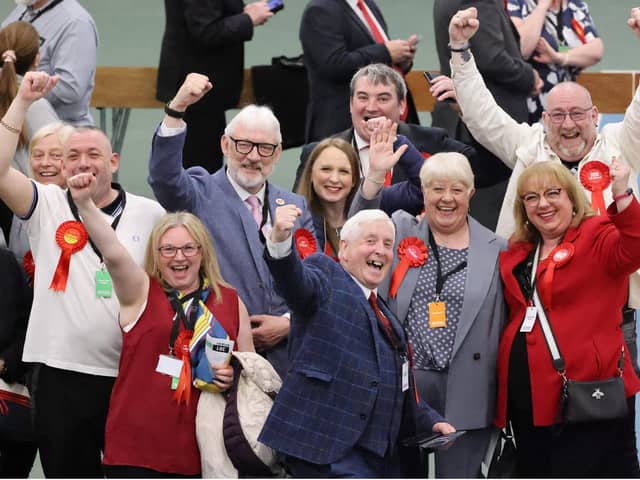 Labour supporters celebrating on the count floor after Alison Smith (grey suit, red rosette and orange tag) won the Redhill seat in Sunderland, pictured along with Labour MP Sharon Hodgson (red suit jacket). North News and Pictures.