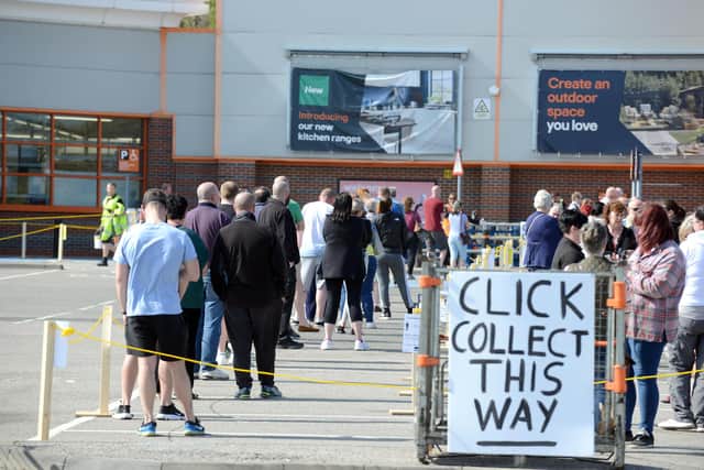 Queue's gather at Washington B & Q which has re-opened