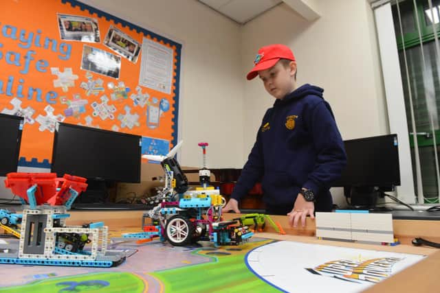 The St Benet's RC Primary School pupils designed, built and programmed robots who complete missions for points in the project