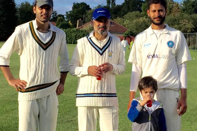 From left to right, Syed Taalay Ahmed, his dad Hashim, and brothers Adil, in cricket shirt, and Hameed, front.