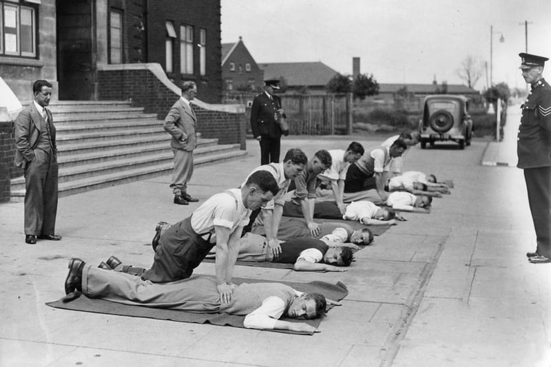 ARP Instructors, assisted by Police Officers, were teaching revival techniques in this 1940s scene. Photo: Hartlepool Museum Service.