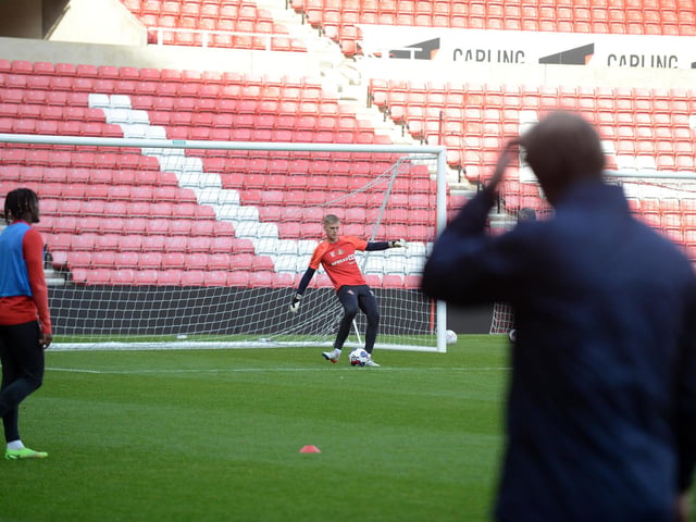 Sunderland goalkeeper Alex Bass practising his passing out from the back.