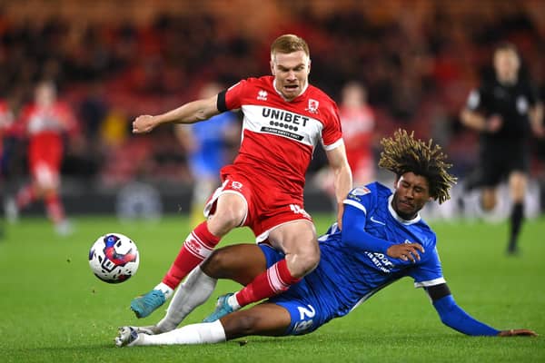 MIDDLESBROUGH, ENGLAND - OCTOBER 05: Birmingham player Dion Sanderson challenges Middlesbrough player Duncan Watmore during the Sky Bet Championship between Middlesbrough and Birmingham City at Riverside Stadium on October 05, 2022 in Middlesbrough, England. (Photo by Stu Forster/Getty Images)
