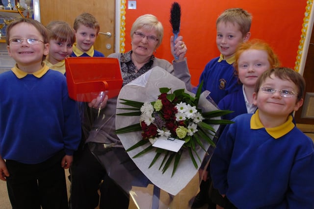 Pupils presented a lovely bouquet of flowers to popular cleaner Dot Teasdale when she retired in 2010 after 35 years of working at the school.