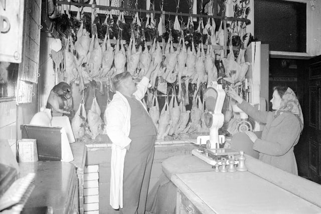 Choosing the Christmas turkey at Tommy Rowntrees in December 1956. Photo: Bill Hawkins.