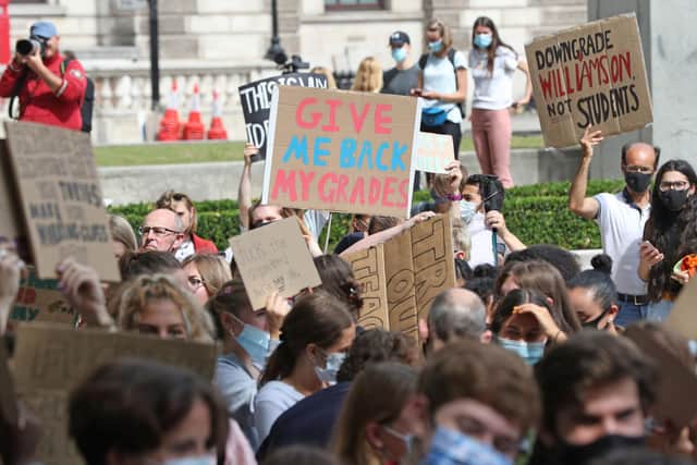 People take part in a peaceful protest in Parliament Square, London, in response to the downgrading of A-level results. Picture: PA.