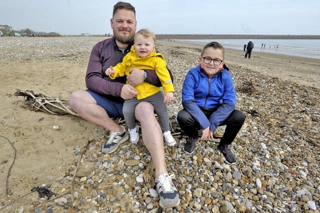 Dad Beaudene Kilty, 39, enjoying the morning playing with his children Jona, one, and Jude, 10, at Roker Beach. 

Picture by FRANK REID