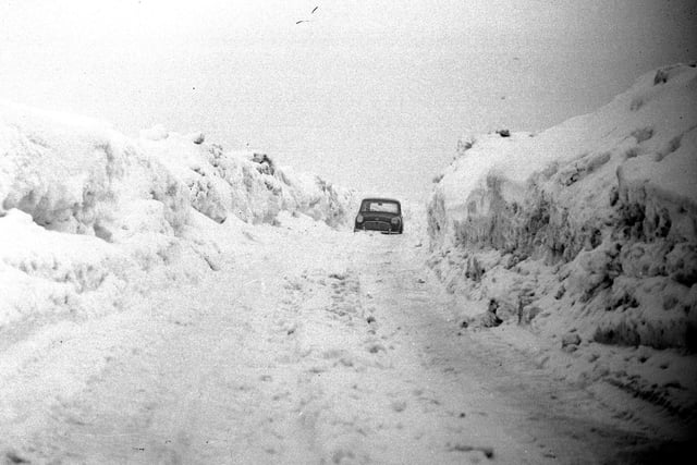 A giant drift on the Durham to Sunderland road at West Rainton in 1963.