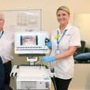 Brian Henderson unveils the new endoscope that he has fundraised for Sunderland Royal Hospital with head and neck consultant Frank Stafford and speech and language therapist Laura-Jayne Watson