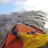 Sunderland RNLI said the man's orange floatation device helped them and other rescue workers spot him out a sea.