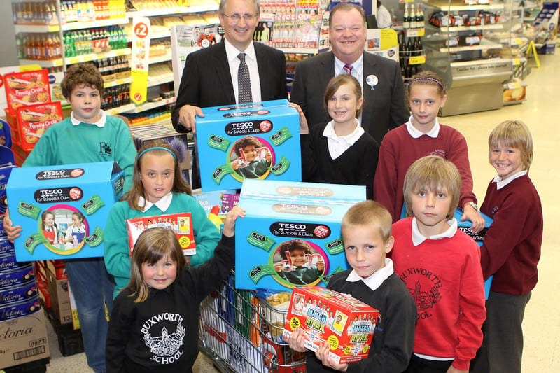 Andrew Bingham MP joins Mark Beaumont manager of Tesco to hand over school equipment to Taxal and Fernilee, Furness Vale, Buxworth and New Mills primary schools.
