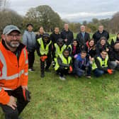 Daniel Krzyszczak, a member of the East Rangers with volunteers who have planted trees in Backhouse Park. Picture by FRANK REID'