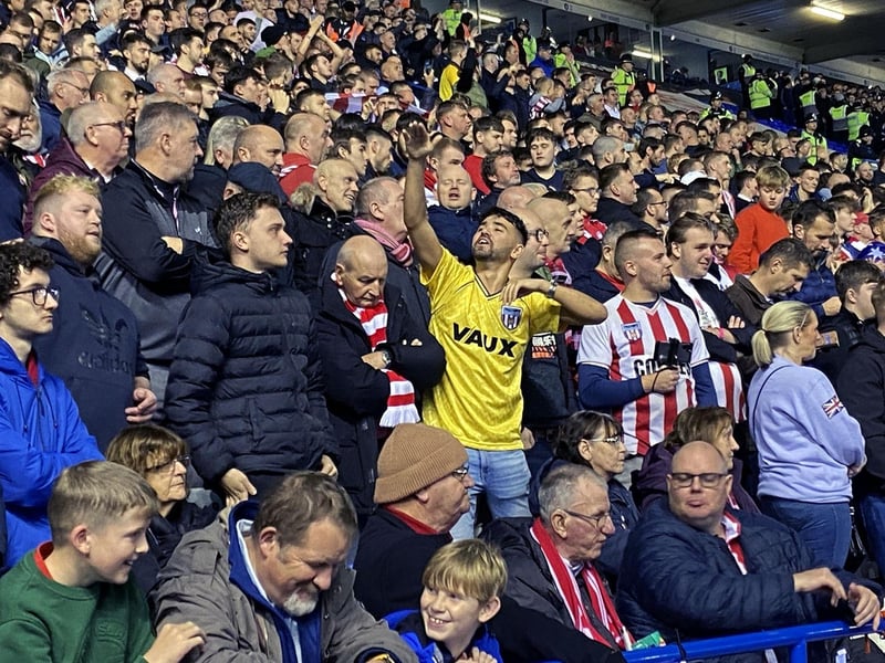 Passionate Sunderland fans cheer the Black Cats on away from home at Birmingham City.