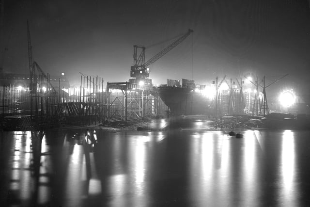 The North Sands yard of Joseph L Thompson and Sons - and that of John Crown and Sons - lit by the glare of arc lights in 1951.