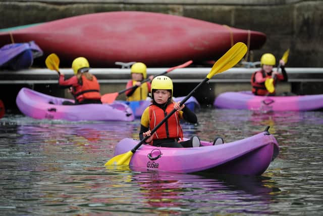 Children enjoying kayaking at Sunderland Marina.