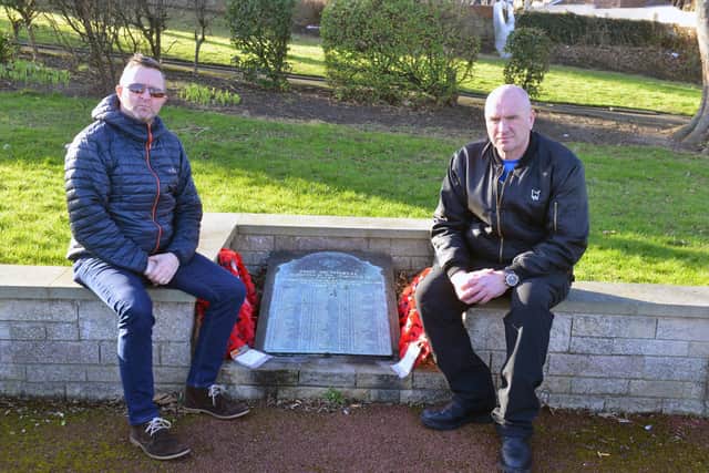 Friends of Fulwell Community Group members Phil Cockton and Peter Curtis would like the memorial plaque to be in an upright position to ensure it is more noticeable.